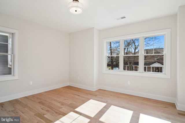 empty room featuring light hardwood / wood-style floors