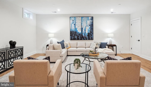 living room with light hardwood / wood-style floors