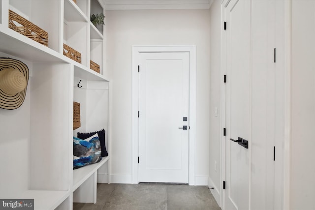 mudroom with concrete floors