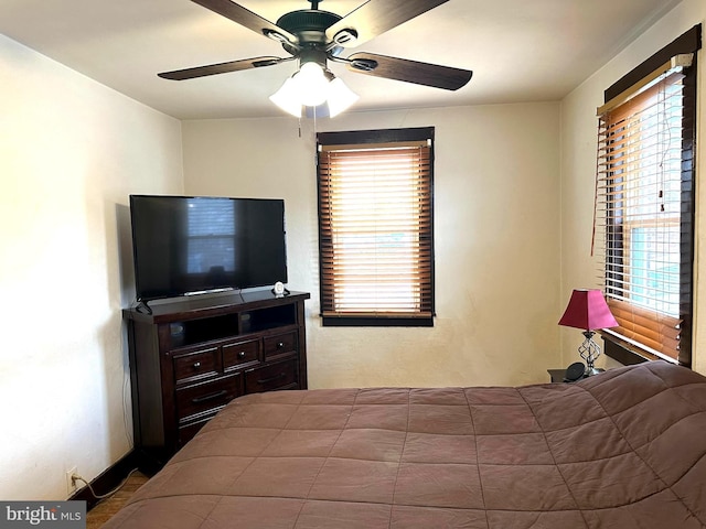 bedroom featuring ceiling fan