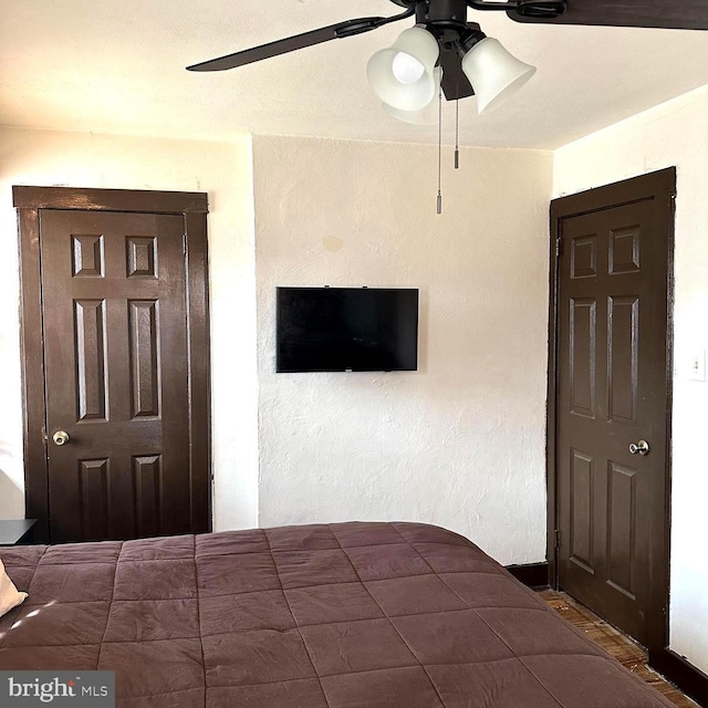 unfurnished bedroom featuring ceiling fan