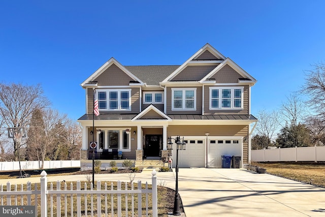 craftsman-style home featuring a garage and a porch