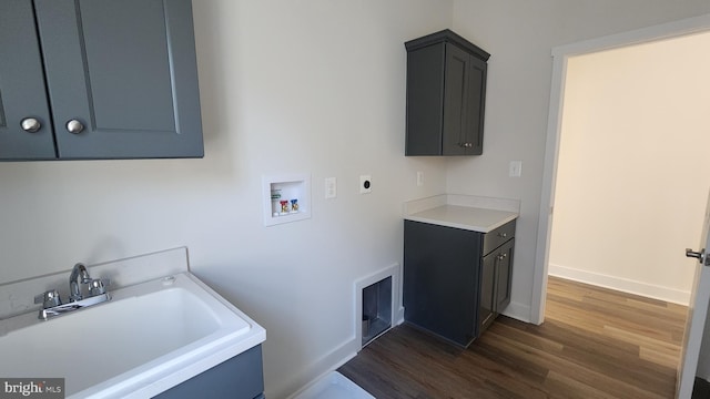00 Sadie, Arnold, MD 21012 - laundry room featuring cabinet space, washer hookup, dark wood-style flooring, hookup for an electric dryer, and baseboards