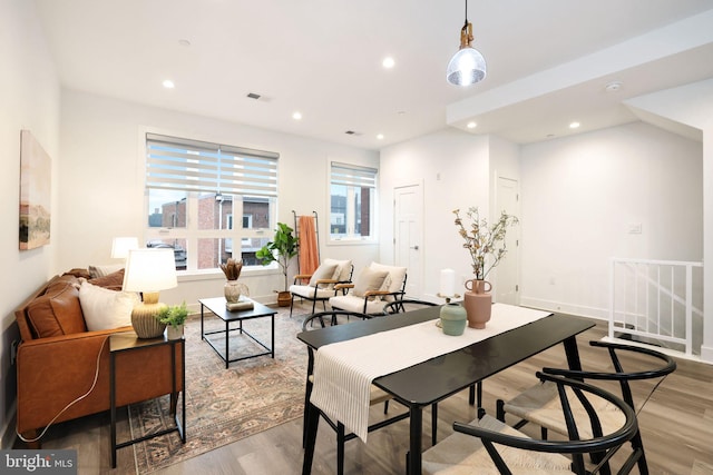 dining area featuring light wood-type flooring