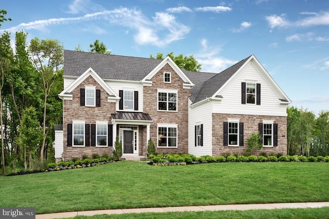 view of front of property with a front lawn