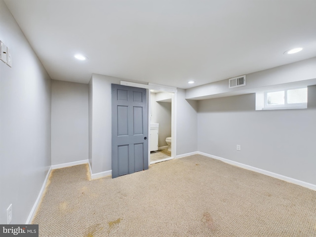 basement featuring carpet flooring