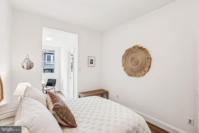 bedroom featuring hardwood / wood-style flooring