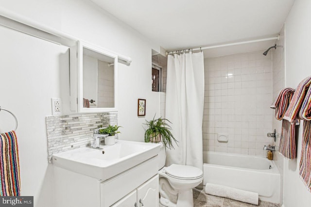 full bathroom with vanity, toilet, shower / tub combo, and decorative backsplash