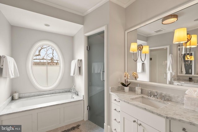 bathroom featuring crown molding, visible vents, a garden tub, and a shower stall