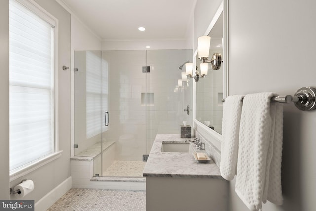 bathroom with tile patterned flooring, recessed lighting, vanity, ornamental molding, and a stall shower