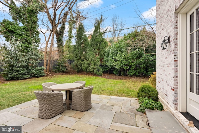 view of patio featuring outdoor dining space