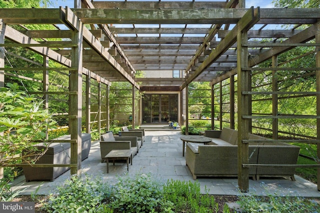 view of patio / terrace featuring a pergola and outdoor lounge area
