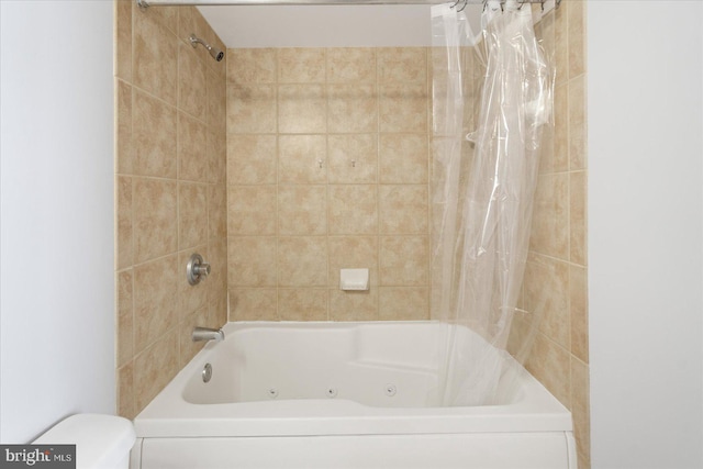 full bath with shower / bathtub combination with curtain and toilet