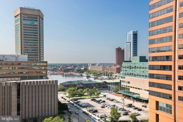 property's view of city featuring a water view