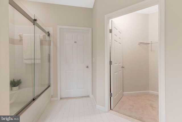 bathroom featuring enclosed tub / shower combo