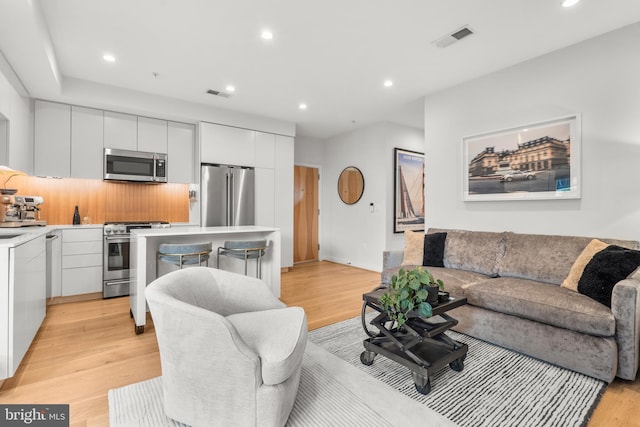 living room featuring light hardwood / wood-style flooring