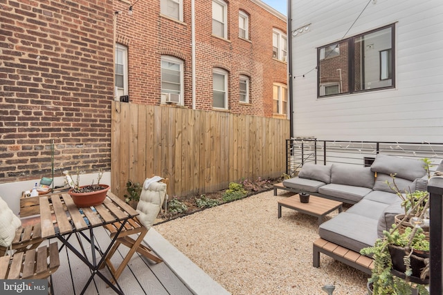 view of patio / terrace featuring cooling unit and outdoor lounge area