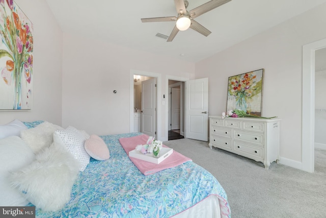 bedroom with light carpet and ceiling fan