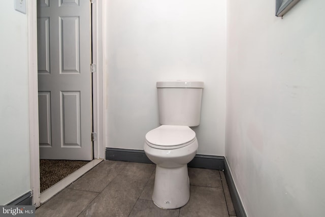 bathroom featuring tile patterned floors and toilet