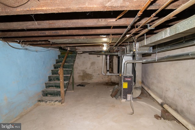 basement featuring heating unit