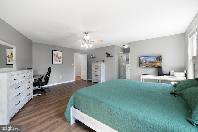 bedroom with a ceiling fan, dark wood-type flooring, and baseboards