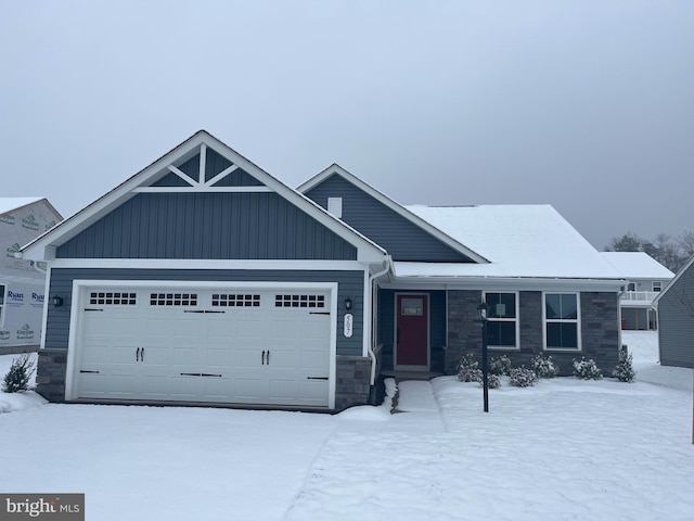 craftsman inspired home with a garage