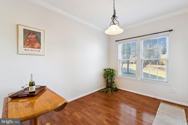 interior space featuring hardwood / wood-style flooring and ornamental molding