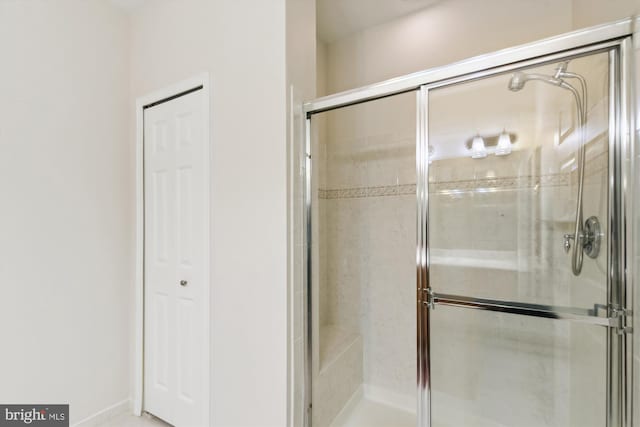 bathroom featuring walk in shower