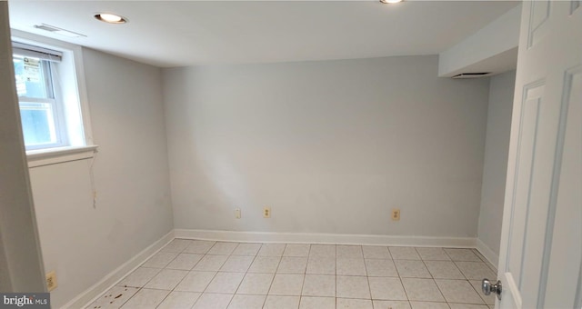 empty room featuring light tile patterned flooring