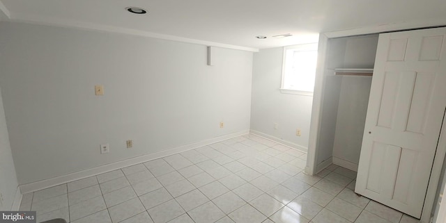 unfurnished bedroom featuring light tile patterned floors