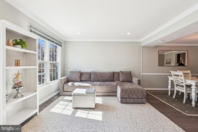 living room featuring ornamental molding, recessed lighting, wood finished floors, and baseboards