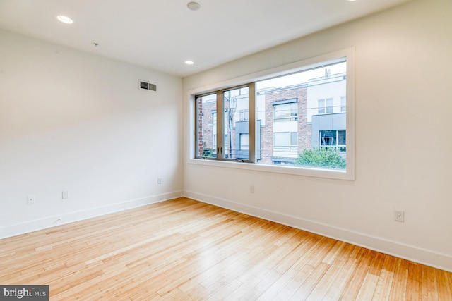 empty room featuring light hardwood / wood-style floors