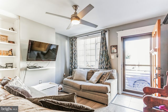 living room with ceiling fan