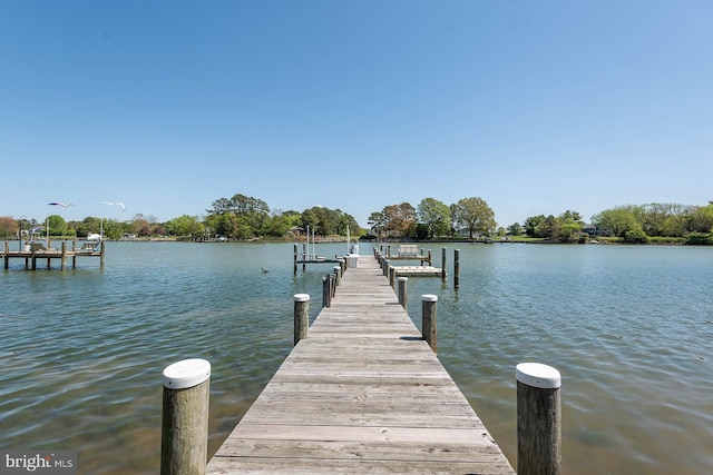 view of dock with a water view