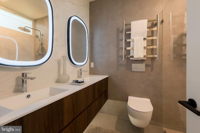 bathroom featuring vanity, tile patterned flooring, a shower, and toilet