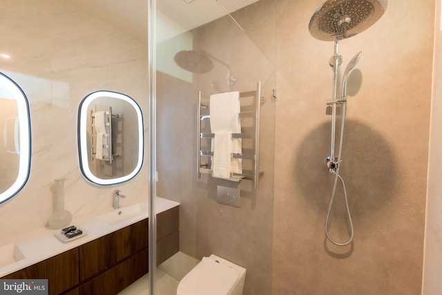 bathroom with vanity and a shower