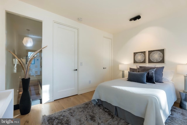 bedroom featuring light hardwood / wood-style flooring