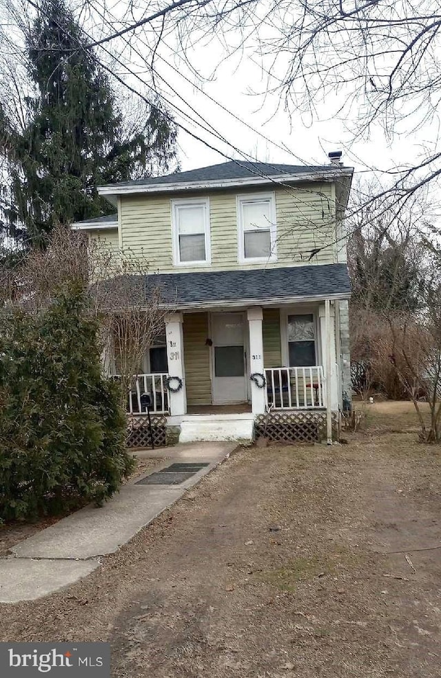 view of front property featuring a porch