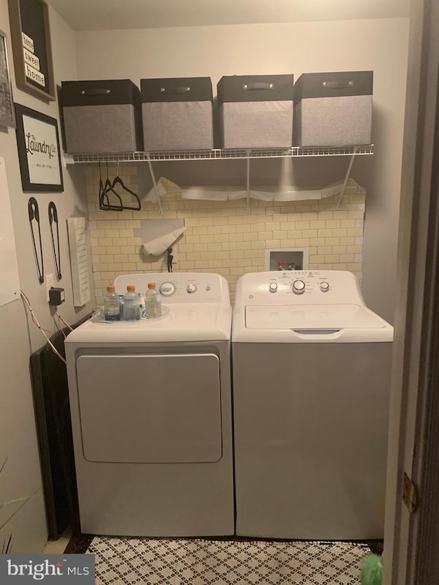 laundry area featuring separate washer and dryer