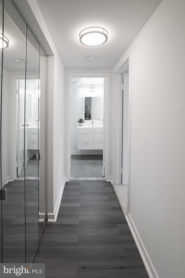 hall featuring dark hardwood / wood-style floors