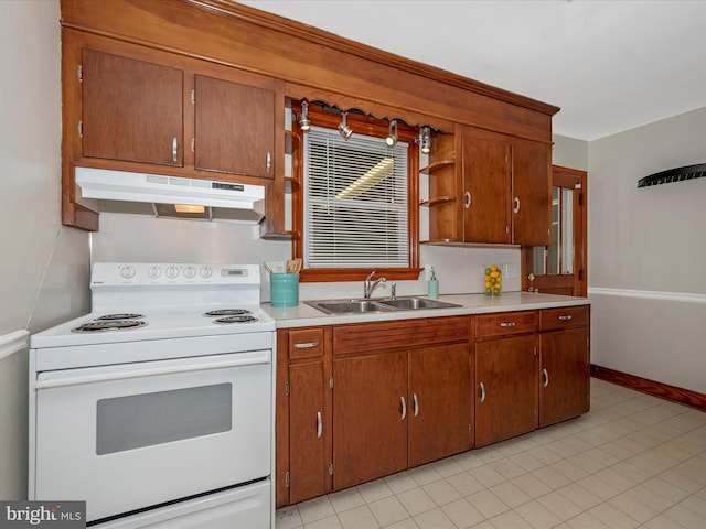 kitchen featuring brown cabinets, light countertops, white electric range, a sink, and under cabinet range hood