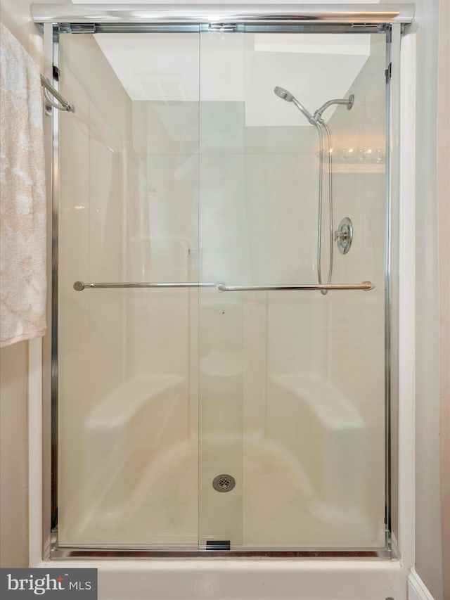 full bathroom with a stall shower