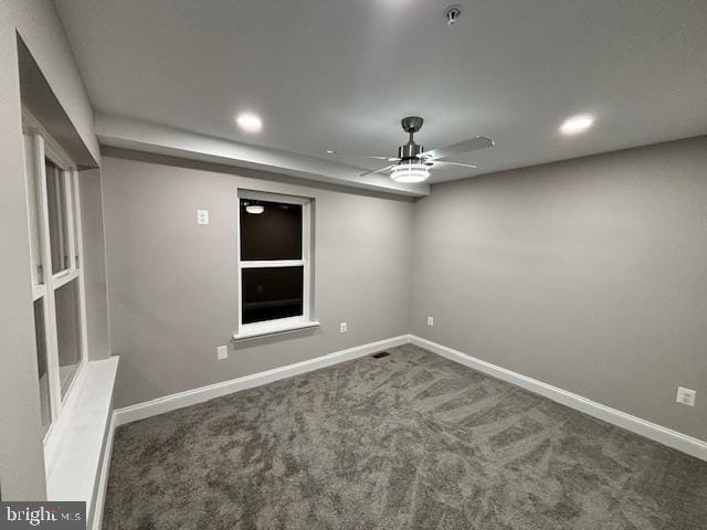 unfurnished room with carpet floors and ceiling fan