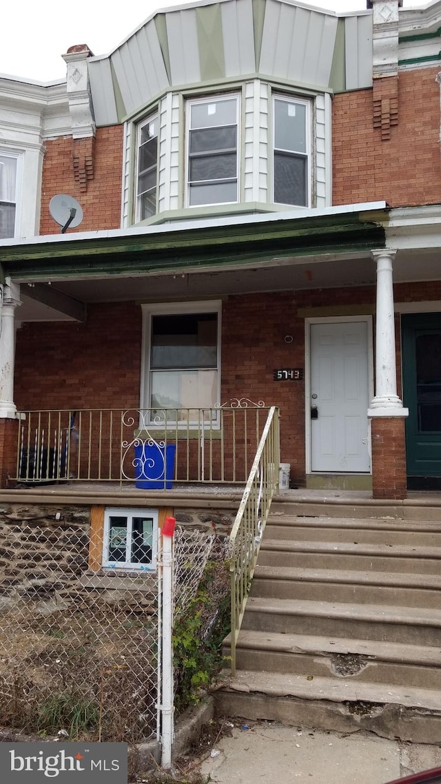 property entrance with a porch