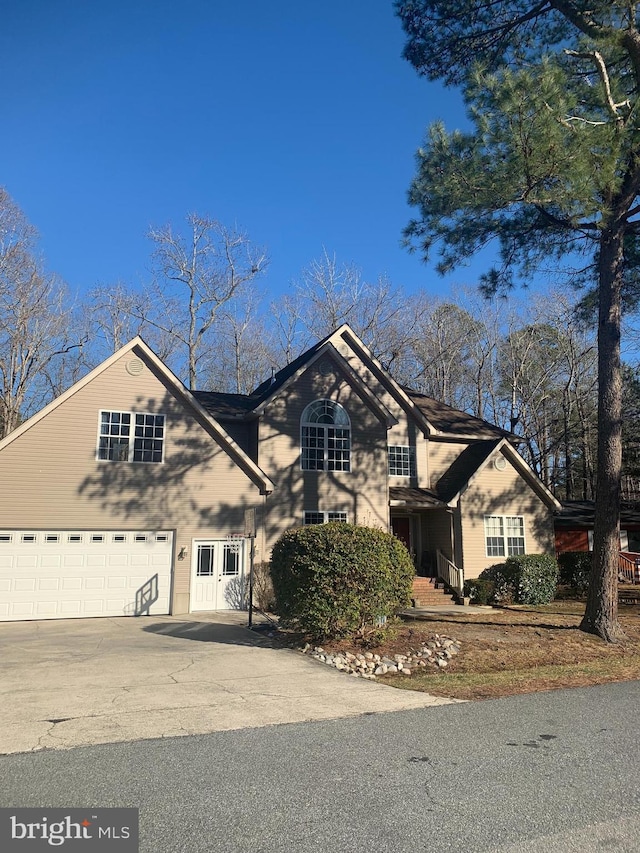 front of property with a garage