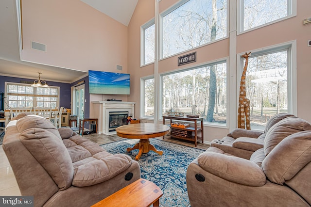 living room featuring lofted ceiling