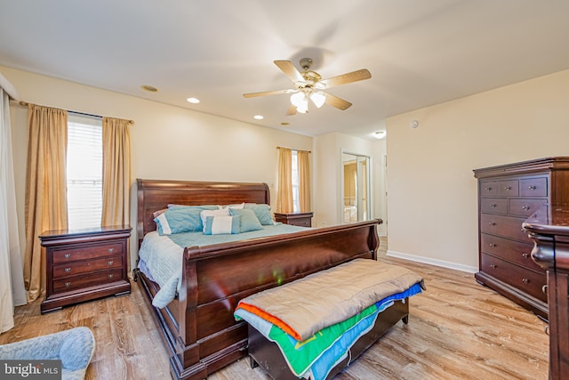 bedroom featuring ceiling fan and light hardwood / wood-style flooring