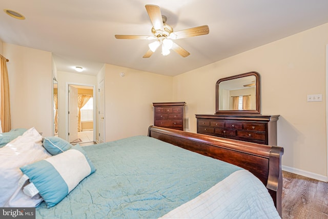 bedroom with hardwood / wood-style flooring and ceiling fan