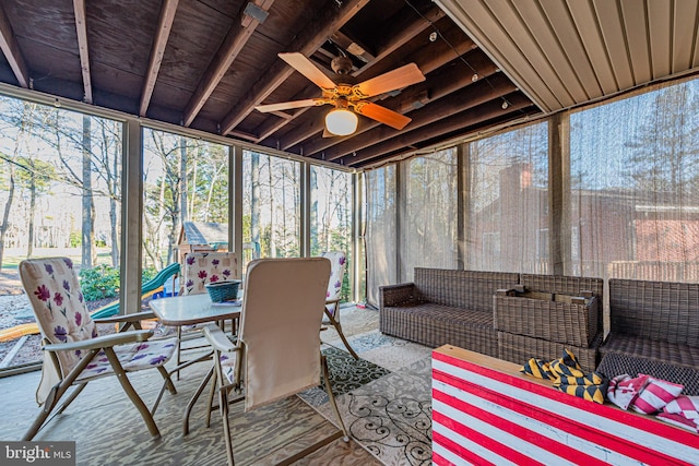 sunroom / solarium with ceiling fan