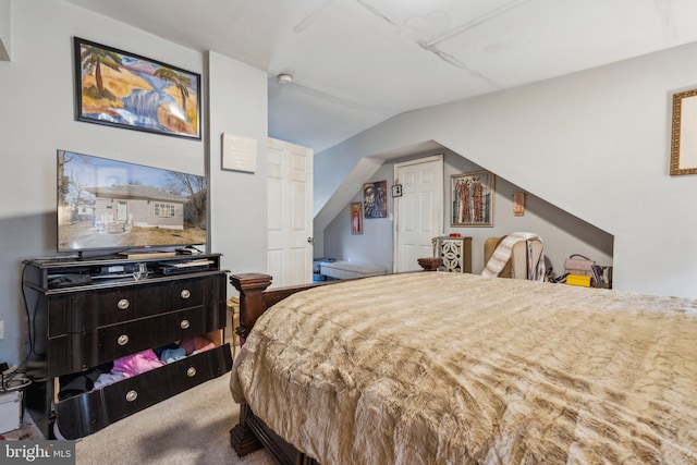 bedroom featuring vaulted ceiling